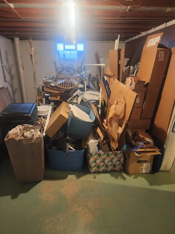 Roll-off dumpster container at job site for Yard Waste Dumpster Rental in Johnson